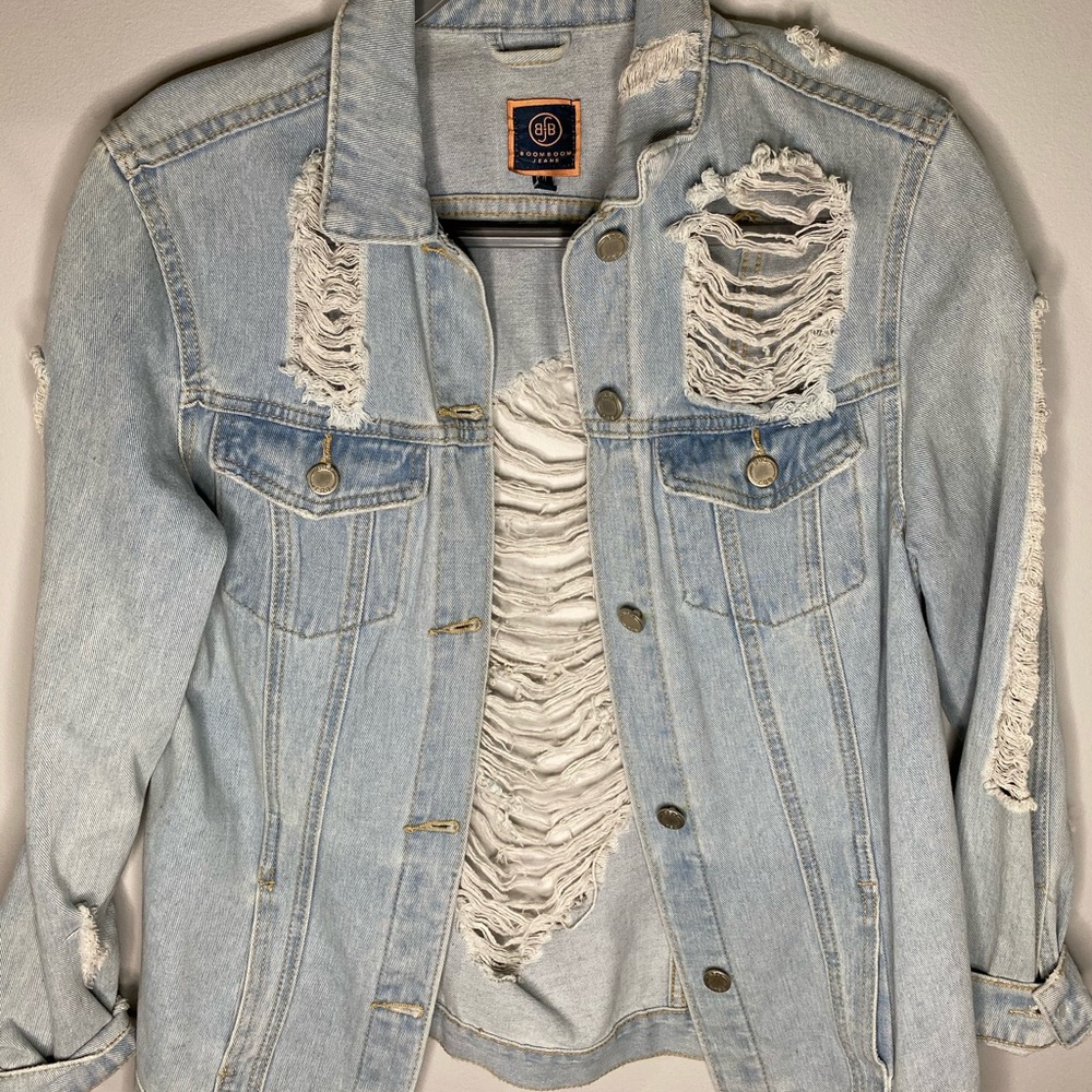 Distressed light wash denim jacket